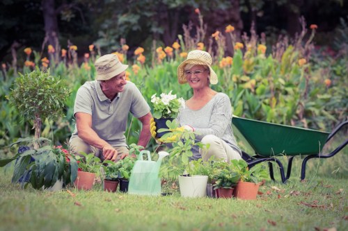 Gardeners in Enfield Town restoring an overgrown garden