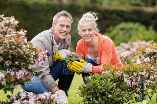 Local gardening team creating a balanced garden in Enfield Town